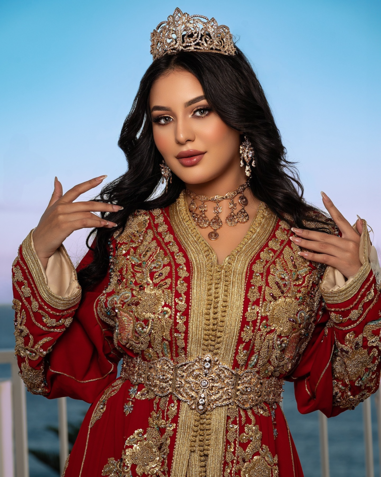 a woman in a red caftan dress